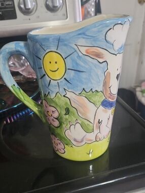 Adorable Pitcher With Happy Doggie